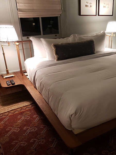 Image of a bedroom in a historic boutique hotel in Charleston, South Carolina