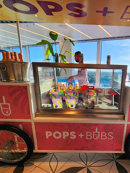 photo of a drink cart with champagne and sodas, called "Pops & Bubs" 