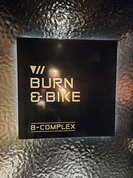 photo of the sign that reads "V Burn & Bike B-Complex" a fitness area on Virgin Voyages cruise